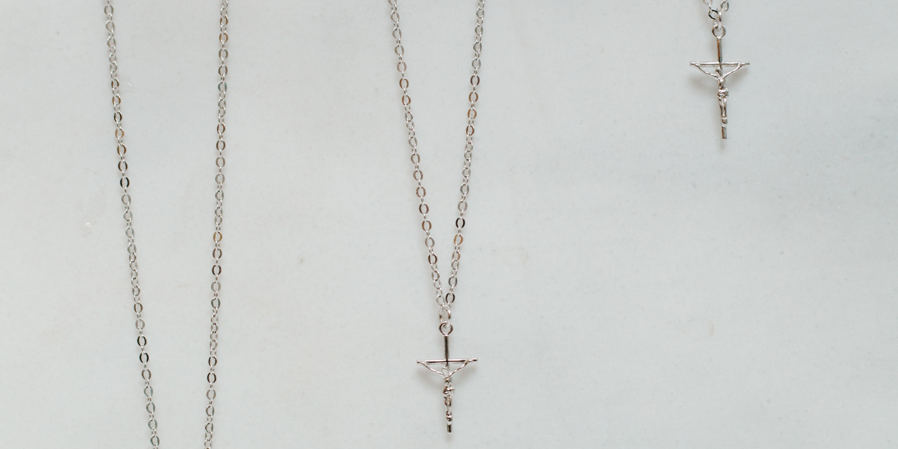 The History and Meaning of the Crucifix in Catholic Jewelry