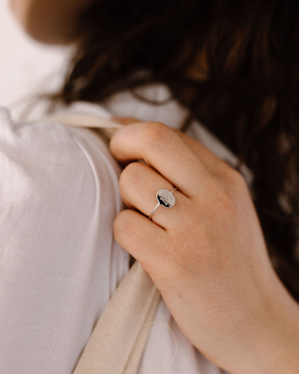 Silver Marian Consecration Ring styled on a woman's hand