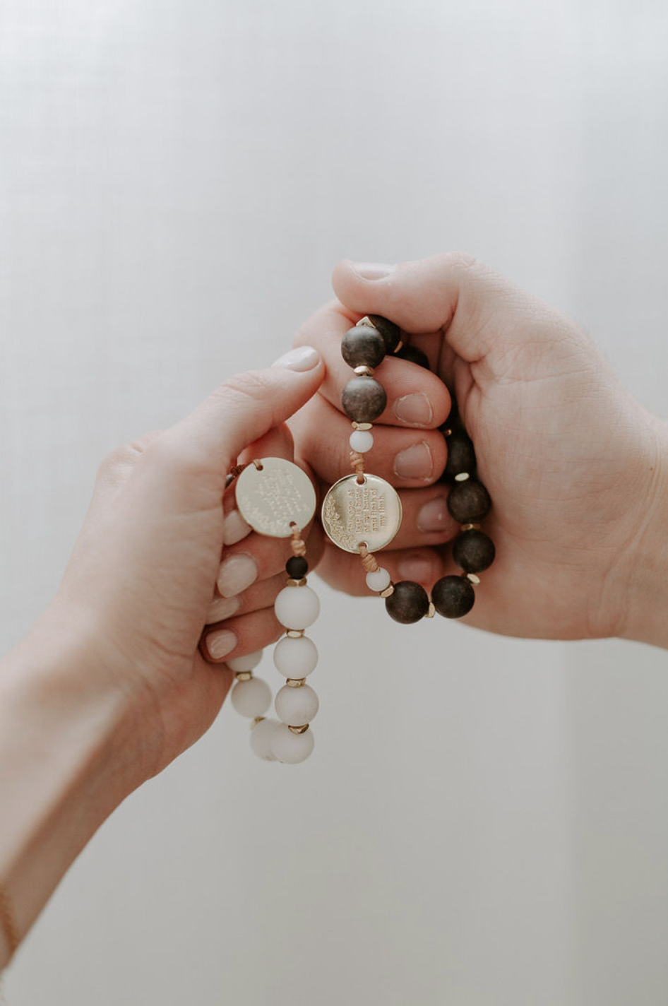 hands praying the eden set rosary