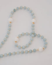 medjugorje rosary bead details on white background