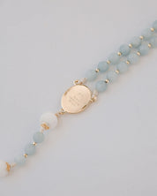 medjugorje rosary gold medal back detail on white background