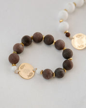 Two beaded rosaries on a white background