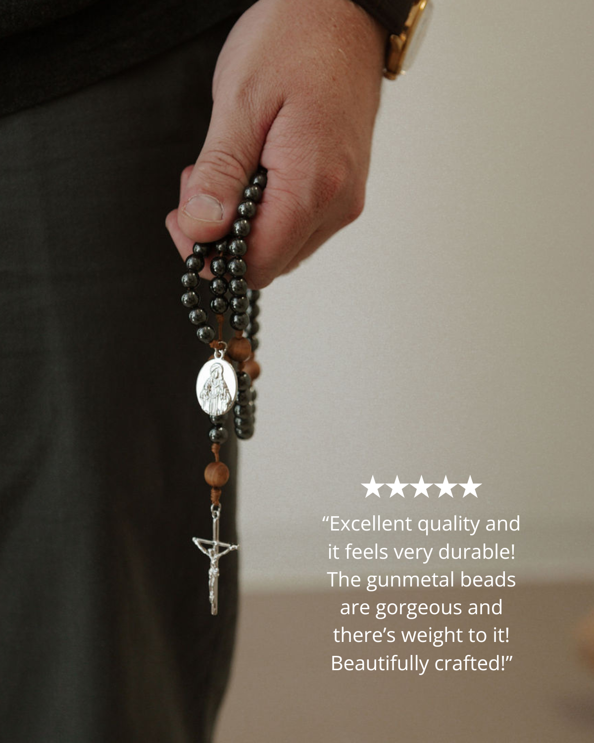 Hand holding a rosary with a neutral background and five-star rating text.