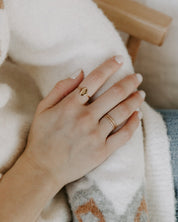 Gold Marian Consecration Ring styled on a woman's hand