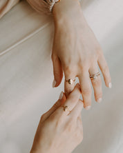 Gold St. Joseph Consecration Ring styled on woman's hand