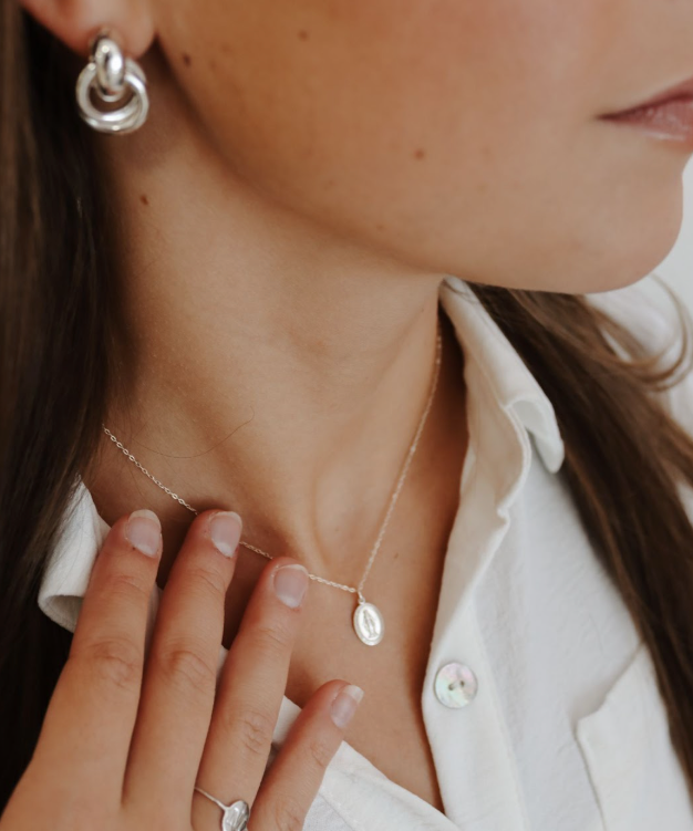 Catholic Jewelry with Meaning: The Power of the Miraculous Medal and Crucifix Necklace