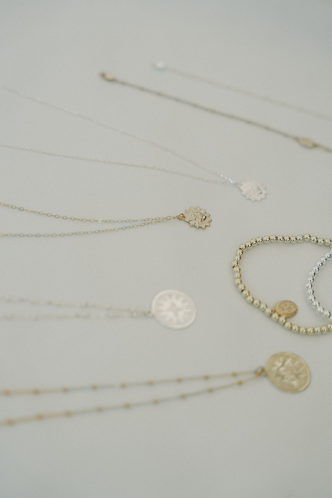 Meaningful Catholic Jewelry Gifts for Women: Miraculous Medal Necklaces, Rings, and Bracelets
