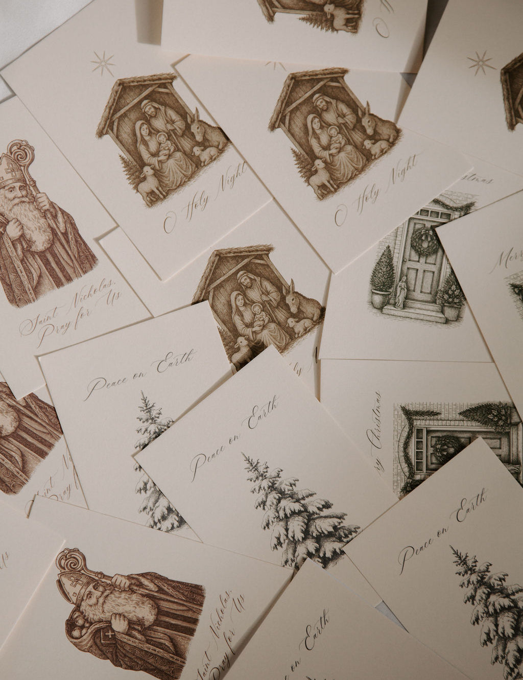 Collection of vintage-style cards with religious illustrations and text.