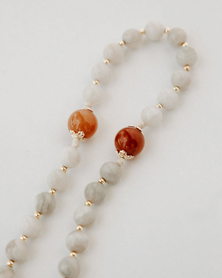 Rosary with white and orange beads