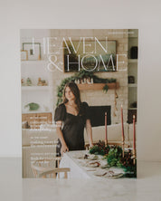 Magazine cover titled 'Heaven & Home' featuring a woman in a kitchen.