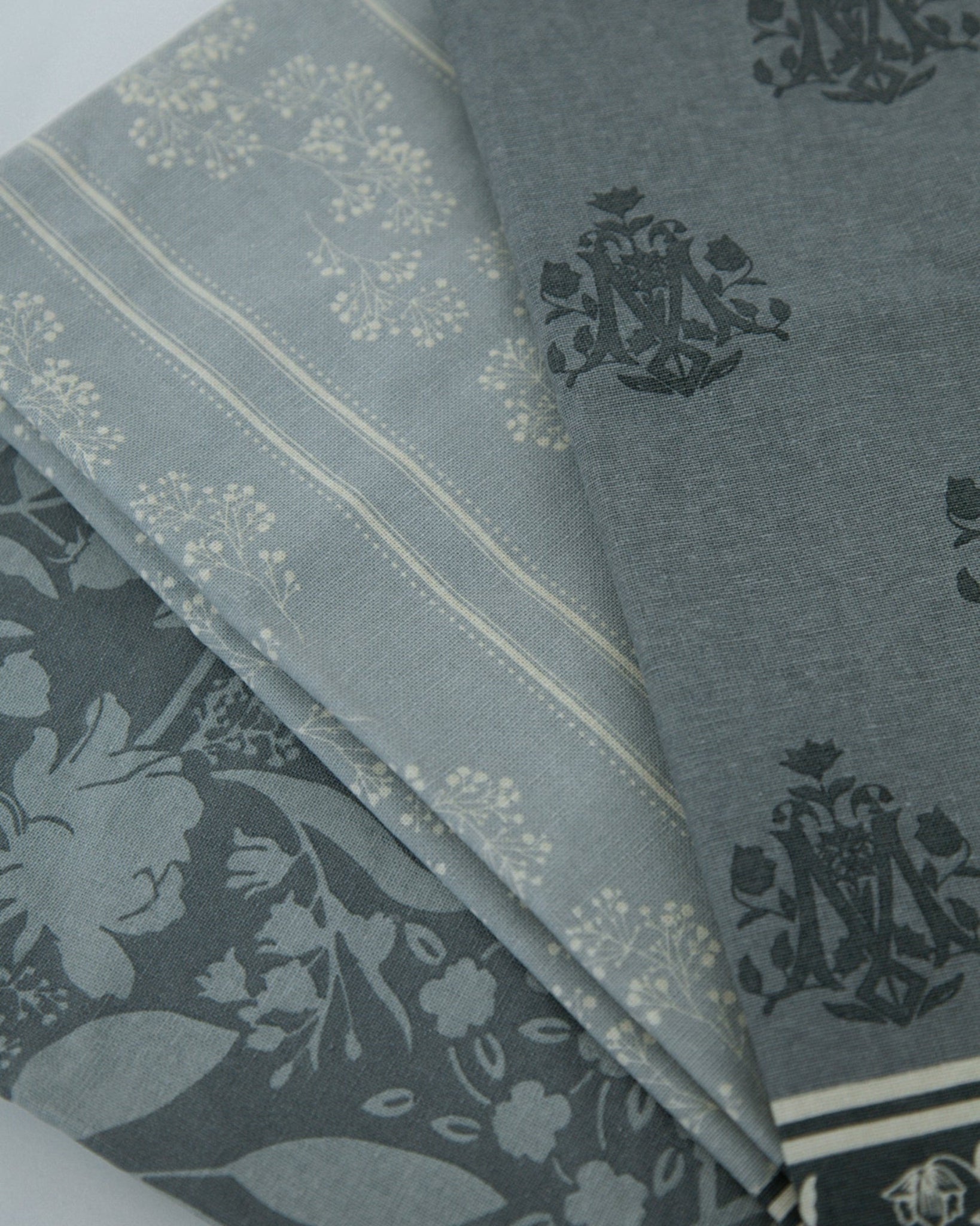 Marian Tea Towels with Marian "M" symbols, flowers, and beautiful blues. 