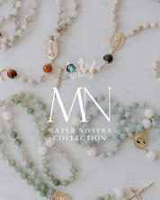Mater Nostra Collection rosaries on a marble surface