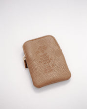 Brown leather rosary pouch with embossed logo on a white background