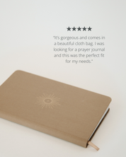 Brown prayer journal with sun design on a white background with 5 star review