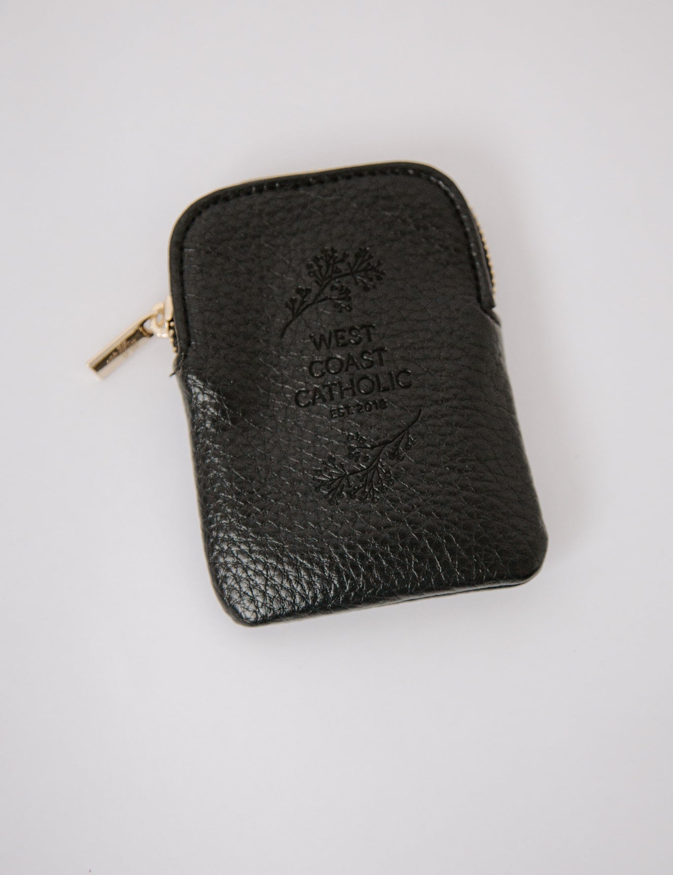 Black leather pouch with 'West Coast Leather' branding on a white background