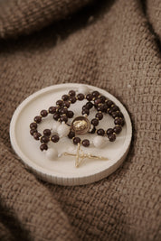 Crown of thorns rosary and rosary dish