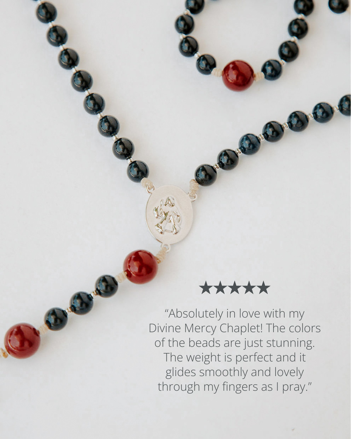 Divine mercy rosary with black and red beads and silver medal review with 5 star rating