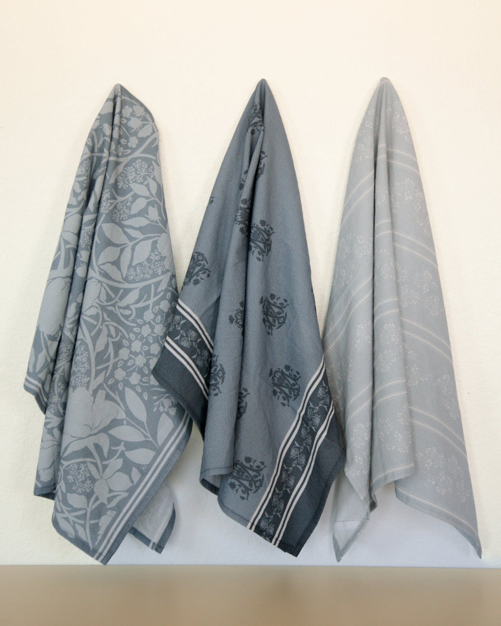 Marian designed tea towels. Featuring Marian blues and symbols as well as florals.