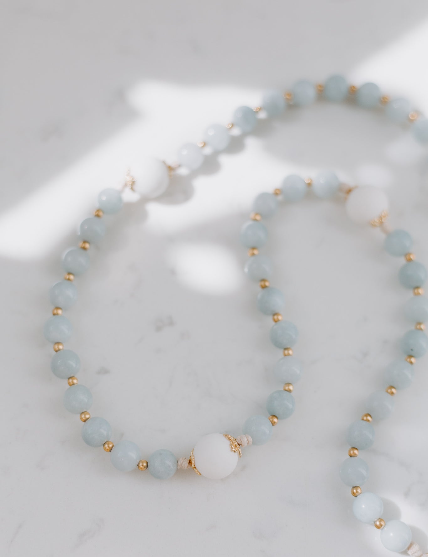 Catholic blue durable rosary beads.