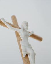 Detail shot of modern wall crucifix on white background