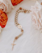 Madonna Rosary styled product photo with flowers