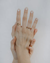 Gold St. Joseph Consecration Ring styled on a woman's hand